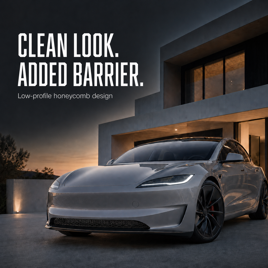Silver electric car with a low-profile black honeycomb intake screen